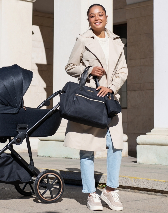 Crafted from luxury materials and enhanced with satin details, the MAXI mama bag combines elegance with durability, offering a stylish yet practical solution for parents on the go.